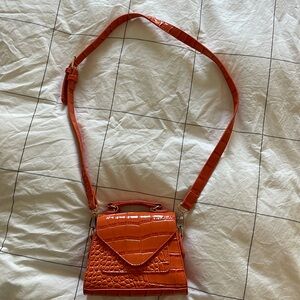Orange croc leather purse